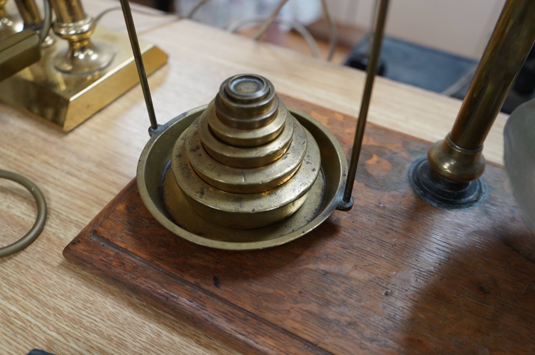 A set of 19th century brass and oak apothecary scales, 43cm